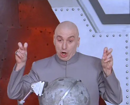 Dr. Evil, bald in a grey suit, making air quotes with both hands