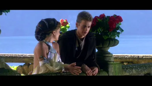 Anakin and Padmé sitting by a lake on Naboo, talking