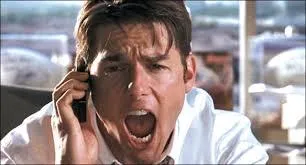 Tom Cruise shouting into a phone