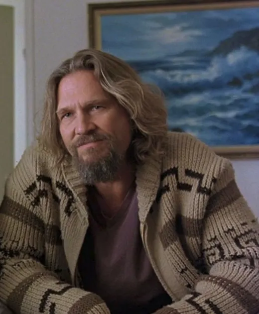 The Dude, with long hair and a goatee, in a patterned sweater